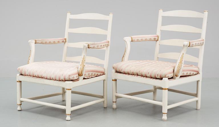 A Gustavian 18th Century armchair. Comprising one copy from the 19th Century.