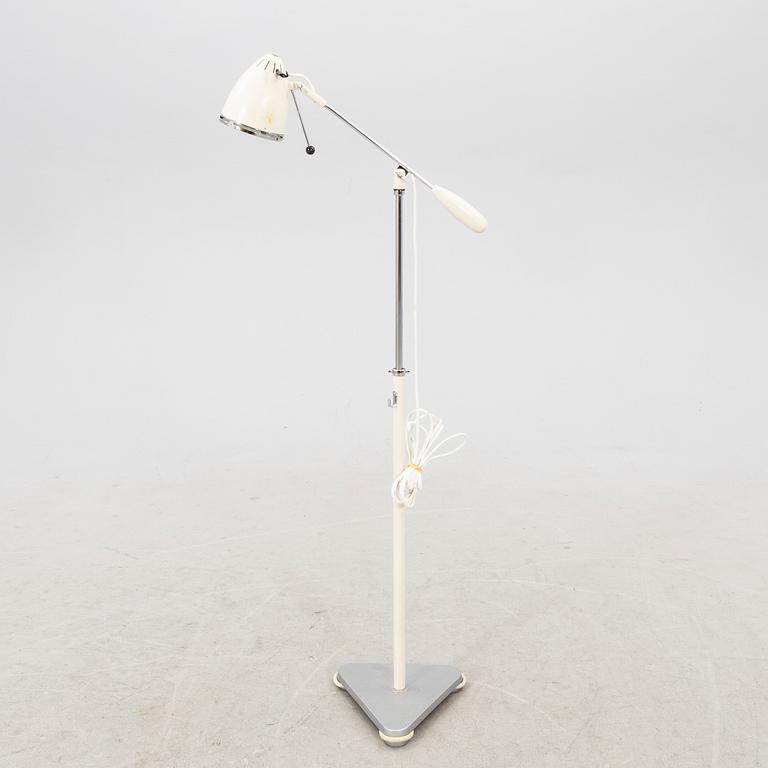 A mid 1900s industrial floor lamp.