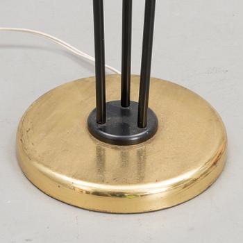 A mid 20th century floor lamp, marked AJH.7.