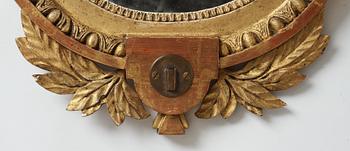 A late gustavian girandole mirror signed by Claes Eric Reding, Karlskrona, (master 1808-1815).