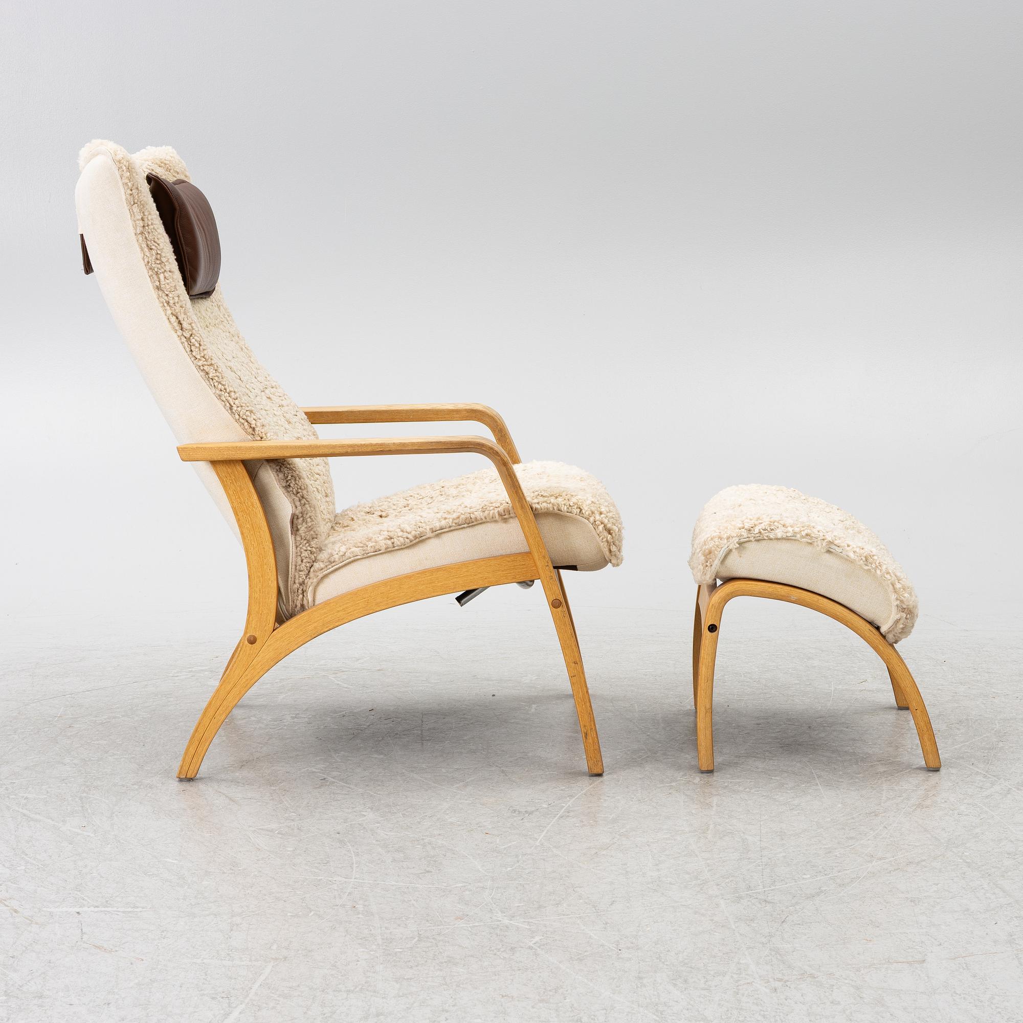 A 'Delta Adventure' armchair with footstool, Brunstad AS, Norway.