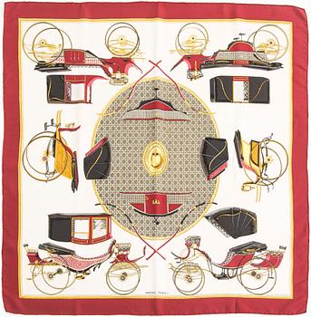 Hermès, a 'Les Voitures à Transformation' silk scarf.