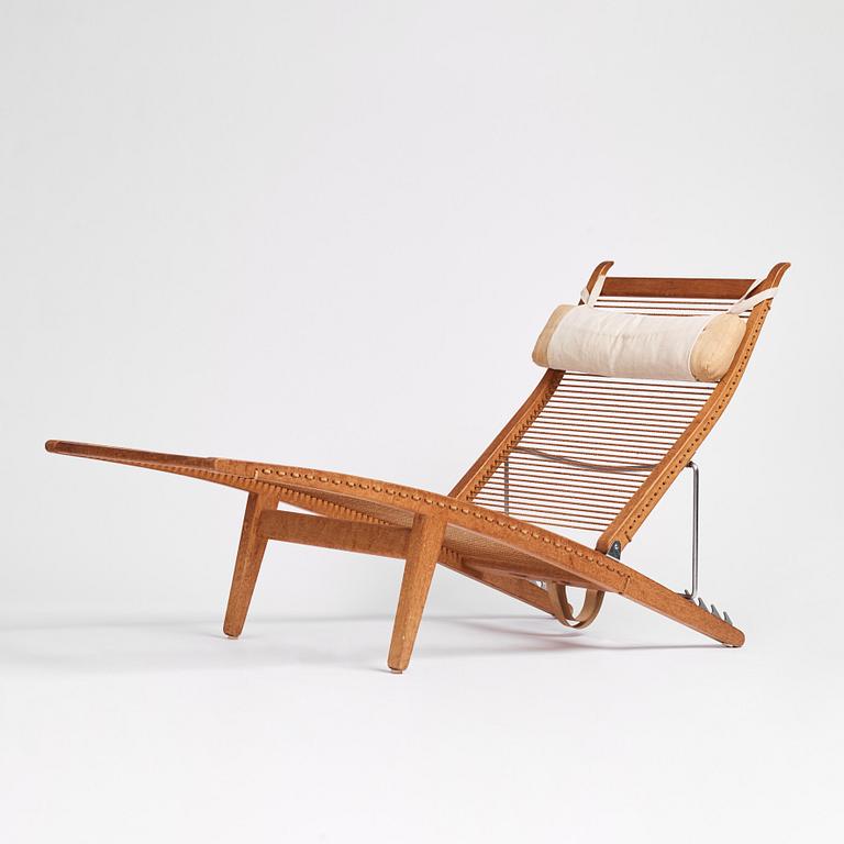 Hans J. Wegner, an oak lounge chair model "JH 524", Johannes Hansen, Copenhagen.