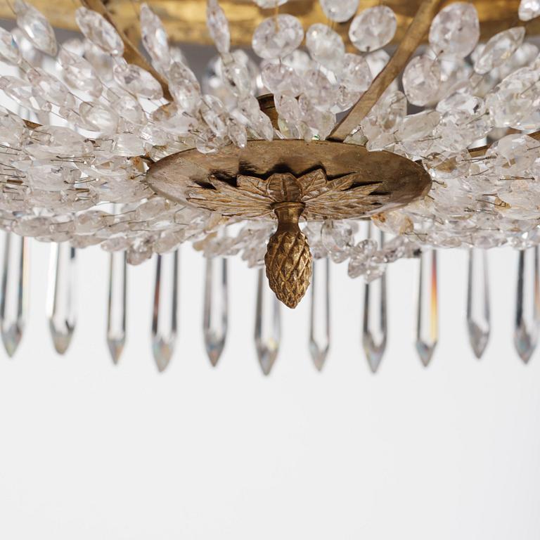 A late Gustavian nine-light gilt brass and cut glass chandelier, Stockholm, late 18th century.