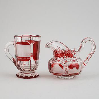 A Bohemian glass jug and glass, 19th century.