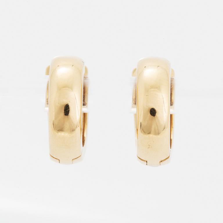 Örhängen, kreoler med briljantslipade diamanter.