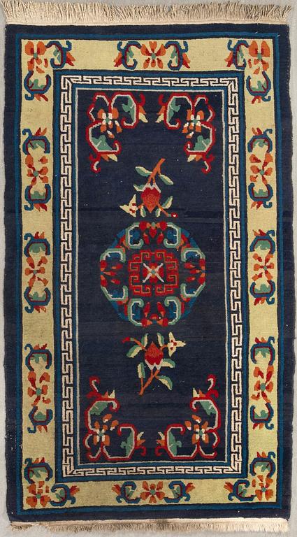 A Tibetan old/semi-antique rug, c. 167 x 95 cm.