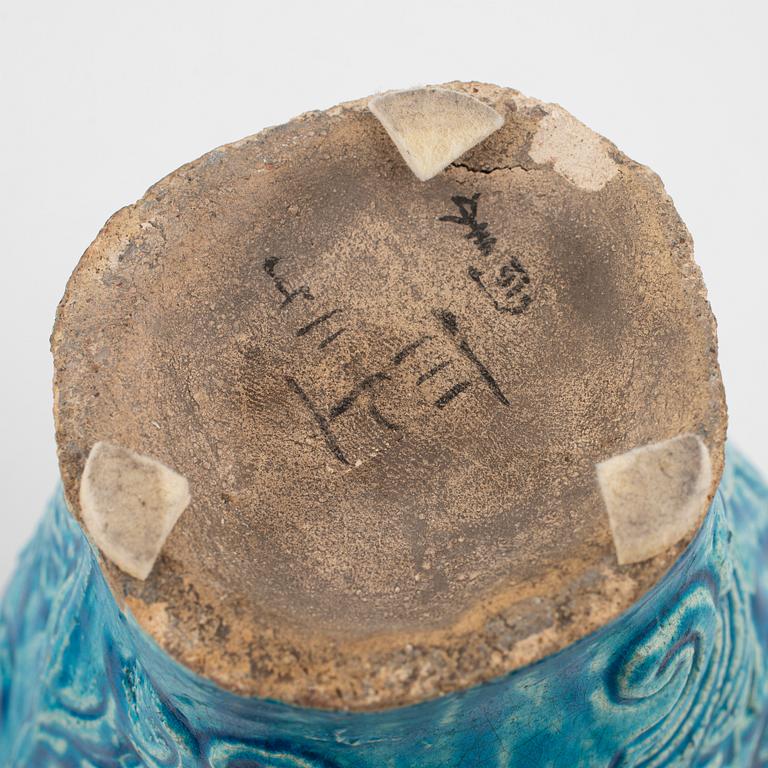 A pair of earthenware vases, late Ming dynasty (1368-1644).