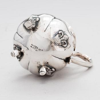 A Russian silver milk jug, and a silver fork, knife and spoon, Saint Petersburg 19th century.