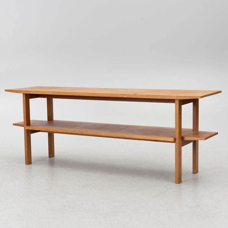 Josef Frank, a model 648 library table, Firma Svenskt Tenn, Sweden, before 1985.
