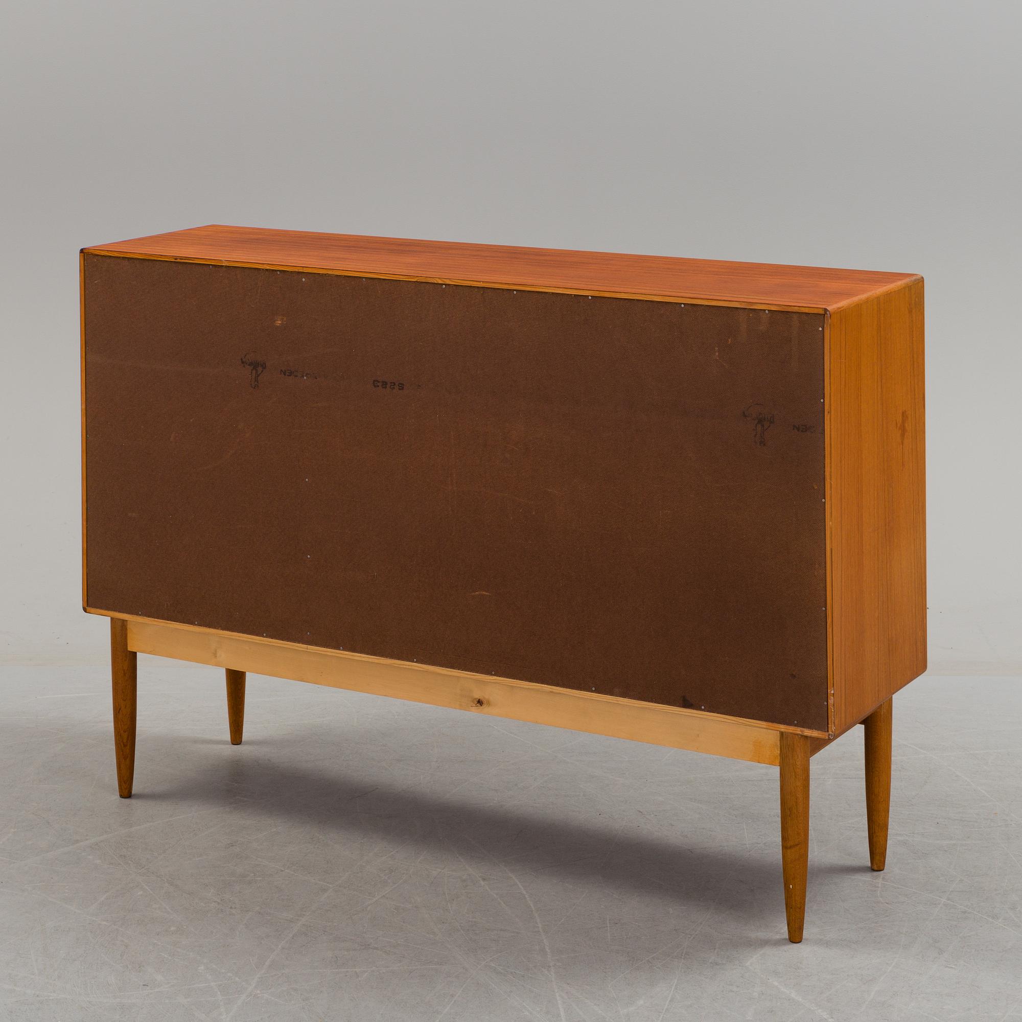 A teak veneered sideboard by Bertil Fridhagen, Bodafors, 1959.