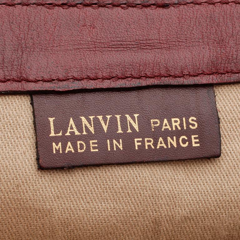 LANVIN, a monogrammed canvas bag.
