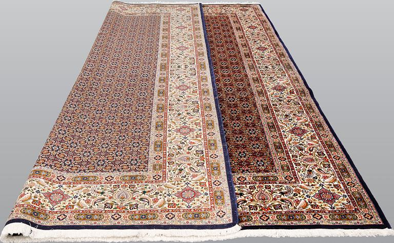 A Moud part silk carpet, signed, 335 x 250 cm.