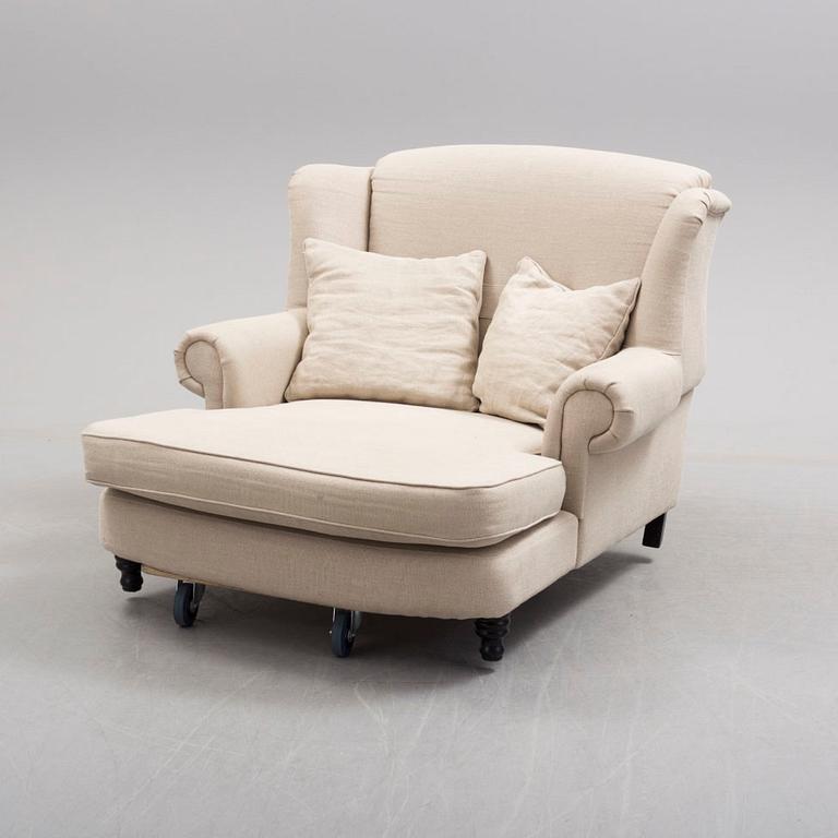 A 'Howard' wing-chair, 21st Century-.