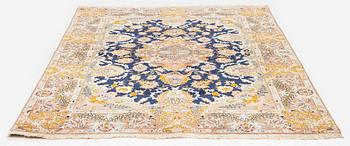 A Tabriz carpet, part silk, c. 206 x 147 cm.