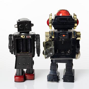 Two toy robots; Sonai 1985, Taiwan and Super Astronaut Horikawa, Japan 1963.