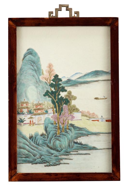 A plaque with enameled decor of a river scenery with buildings, Qing Dynasty, early 20th Century.