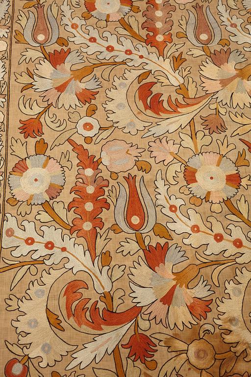 An embroidery, probably an antique Uzbekistan suzani, ca 226,5-230,5 x 180-182 cm.