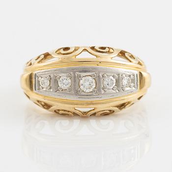 14K gold and brilliant cut diamond ring.