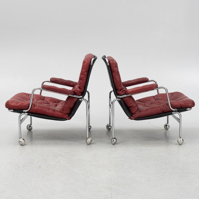 Bruno Mathsson, a pair of leather upholstered 'Karin 73' easy chairs from Dux.