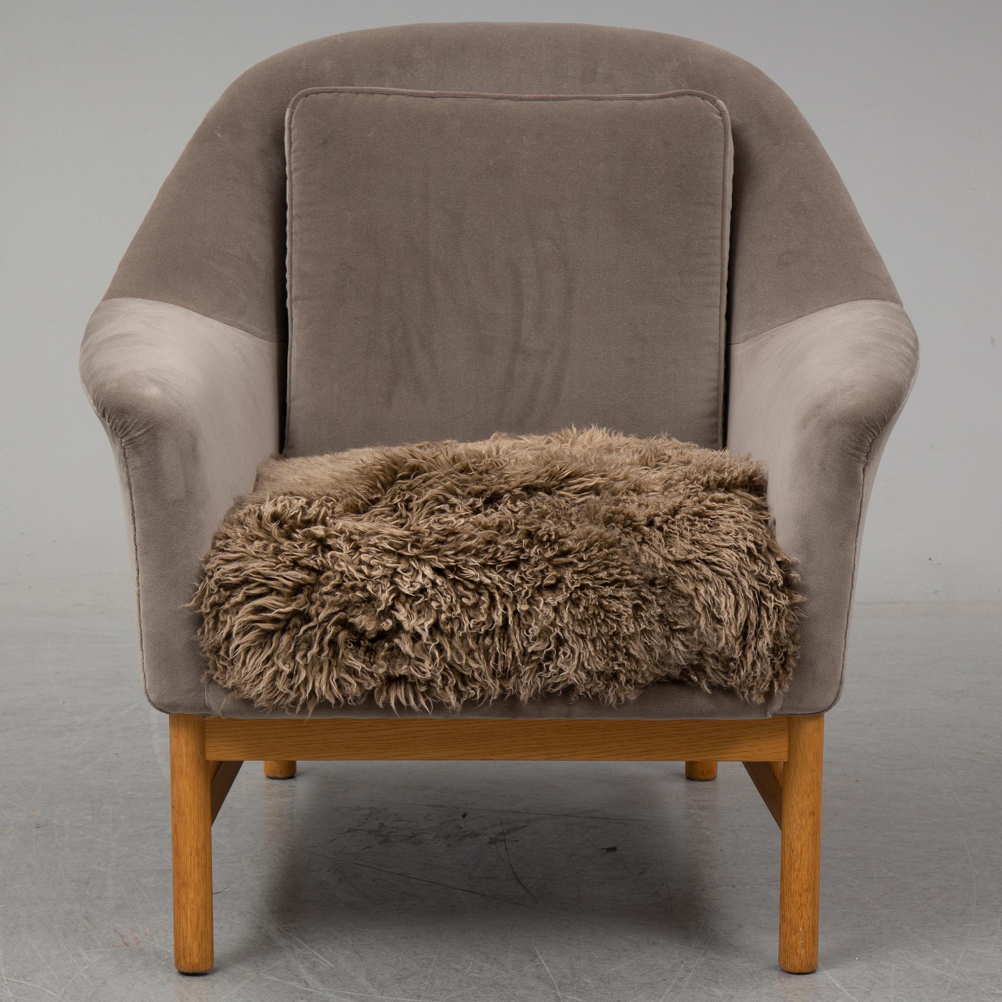 KERSTIN HÖRLIN-HOLMQUIST, a 'Napoleon' easy chair, Nyköping, Nordiska Kompaniet, mid 20th century.