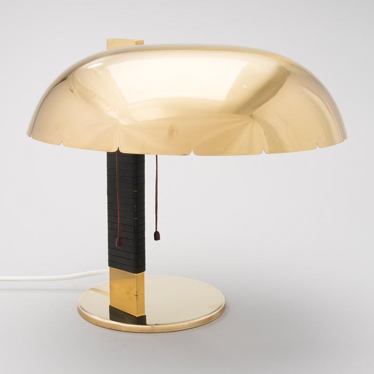 A mid 20th century '9228' table lamp for Idman Finland.