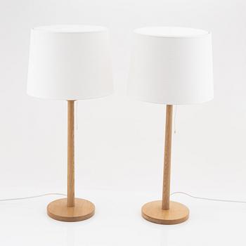 Uno & Östen Kristiansson, a pair of oak table lights, Luxus, Vittsjö.