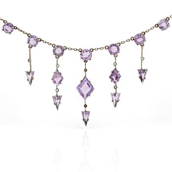 ÖRHÄNGEN samt COLLIER, förgyllt silver 830, halssmycket med ametister.