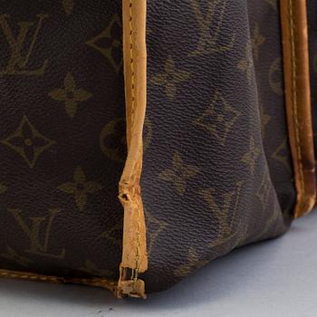 A monogram canvas 'Hunting Kleber' bag from Louis Vuitton.