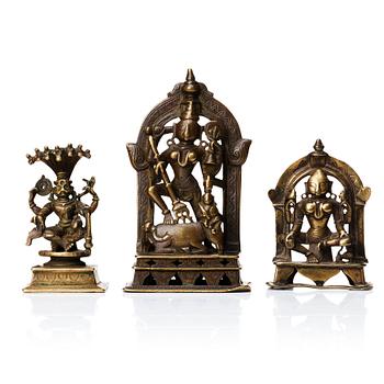 Three bronze figures of deities, India.