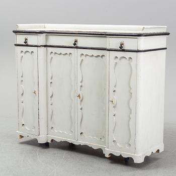 A mid 19th century painted cupboard.