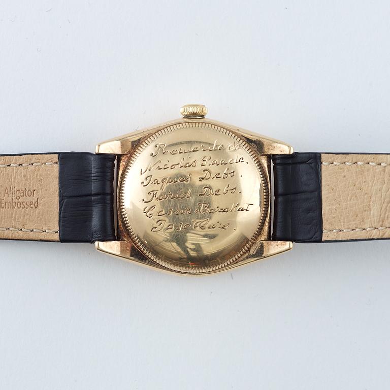 Rolex - "Bubbleback". Guld. Automatiskt. Ø 31 mm.