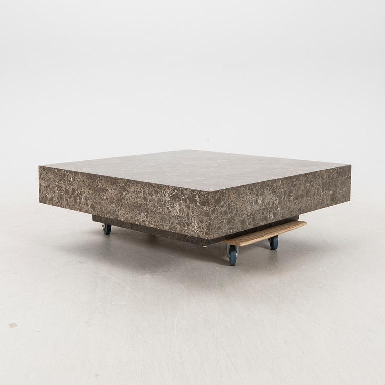 A late 20th century travertine coffee table.