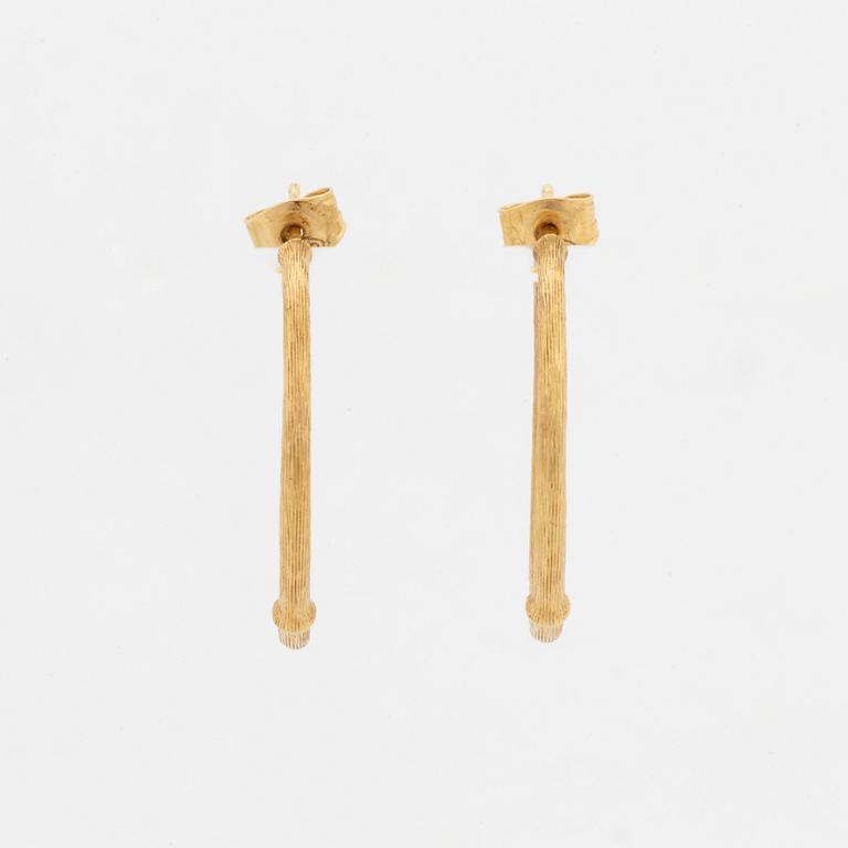 Ole Lynggaard, 18K gold earrings.
