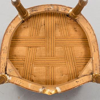 A Gustavian style arm chair, first half ot the 20th Century.