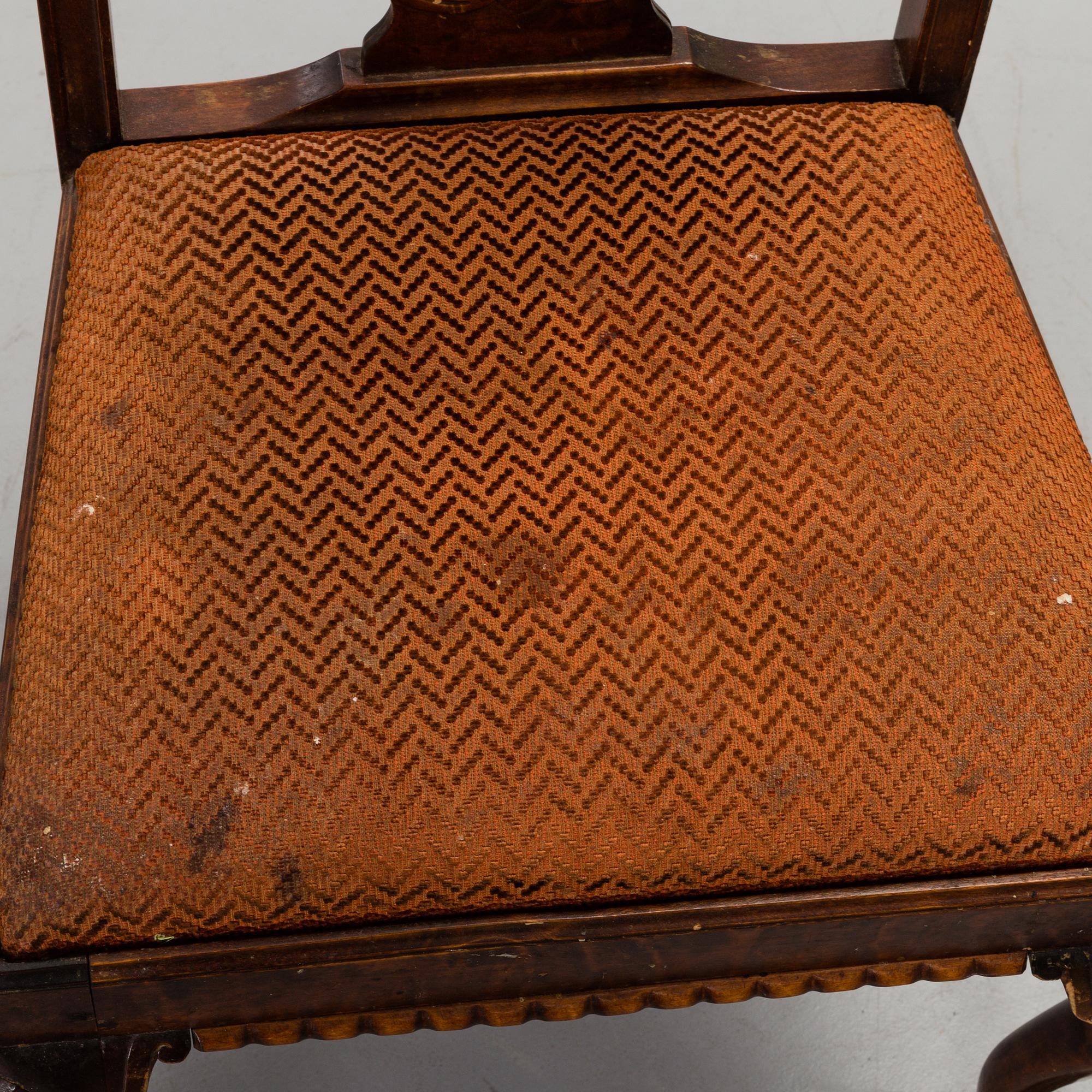 A 1920's 7 piece Chippendale-style dining group.