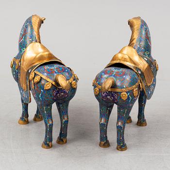 A pair of Chinese cloissoné horses, 20th Century.
