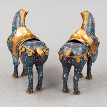 A pair of Chinese cloissoné horses, 20th Century.