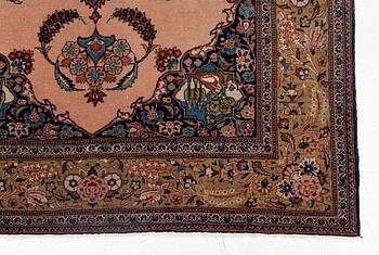 A semi-antique pictoral Kashan rug, part silk, c 207 x 134 cm.