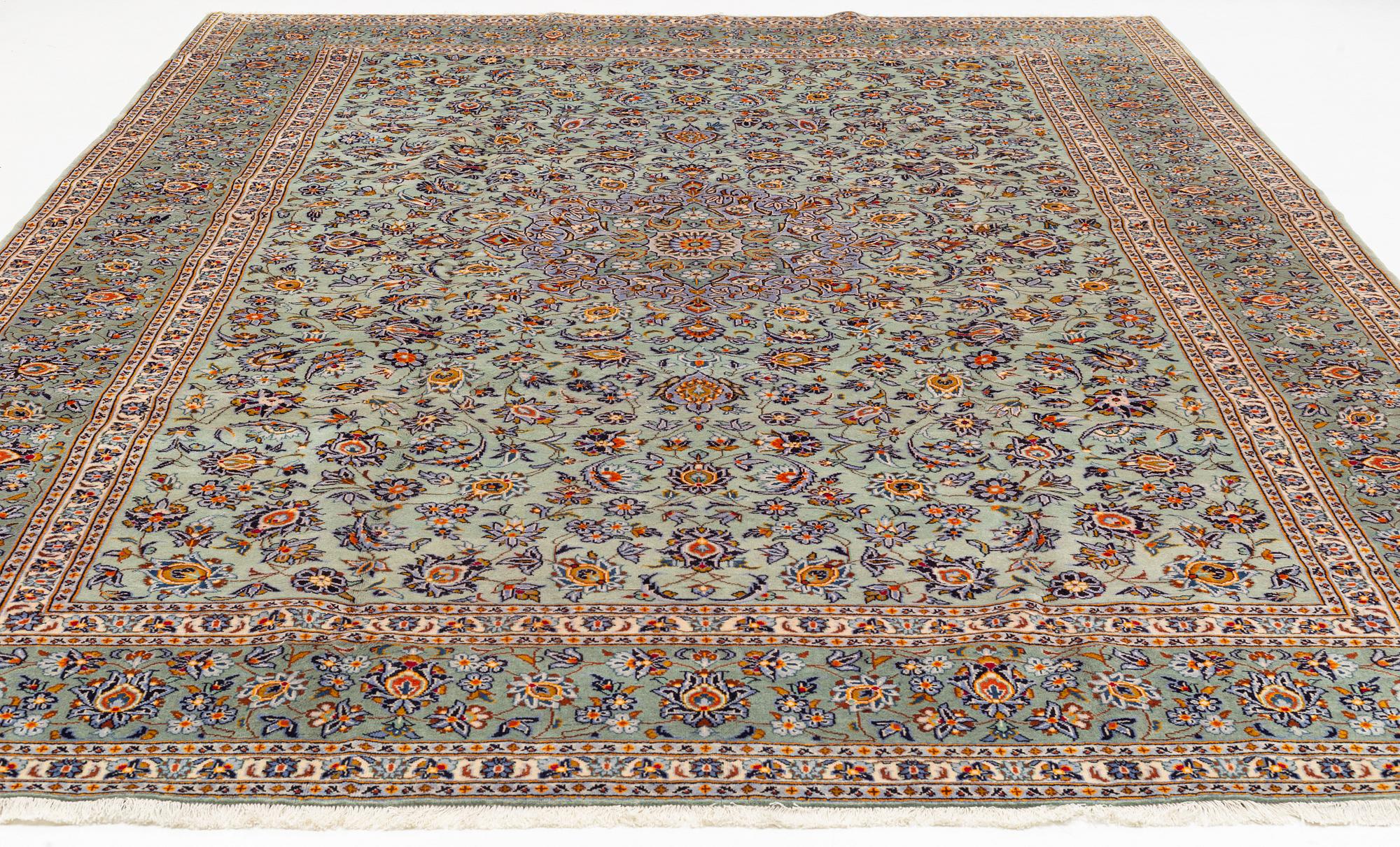 A Kashan carpet, 410 x 300 cm.