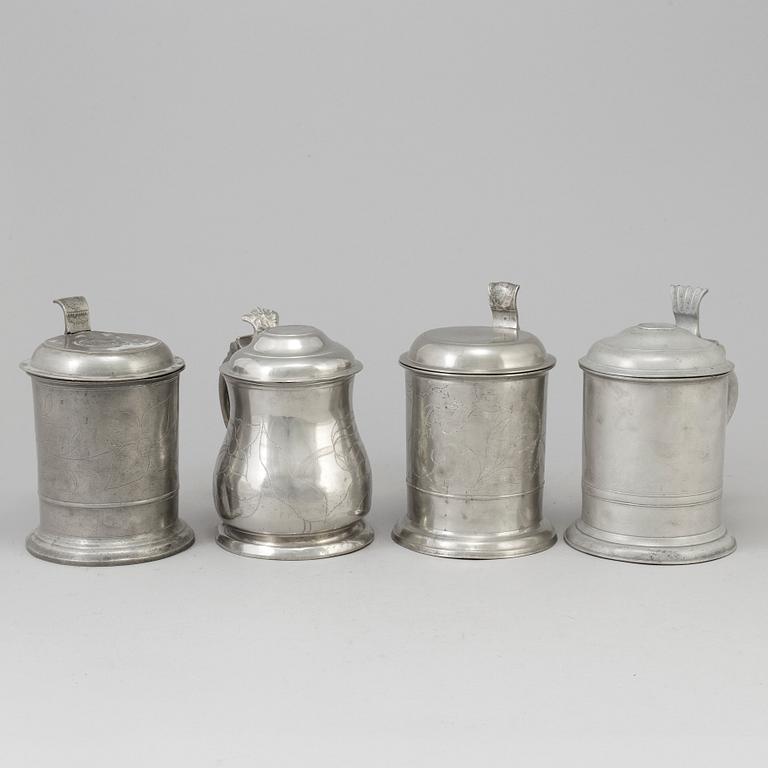 Four Swedish pewter tankards, 19th century.