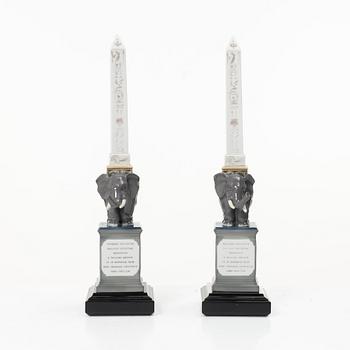 Lladró, figurines, a pair, "Pulcini obelisk enamels left" and "Pulcini obelisk enamels right", Spain.
