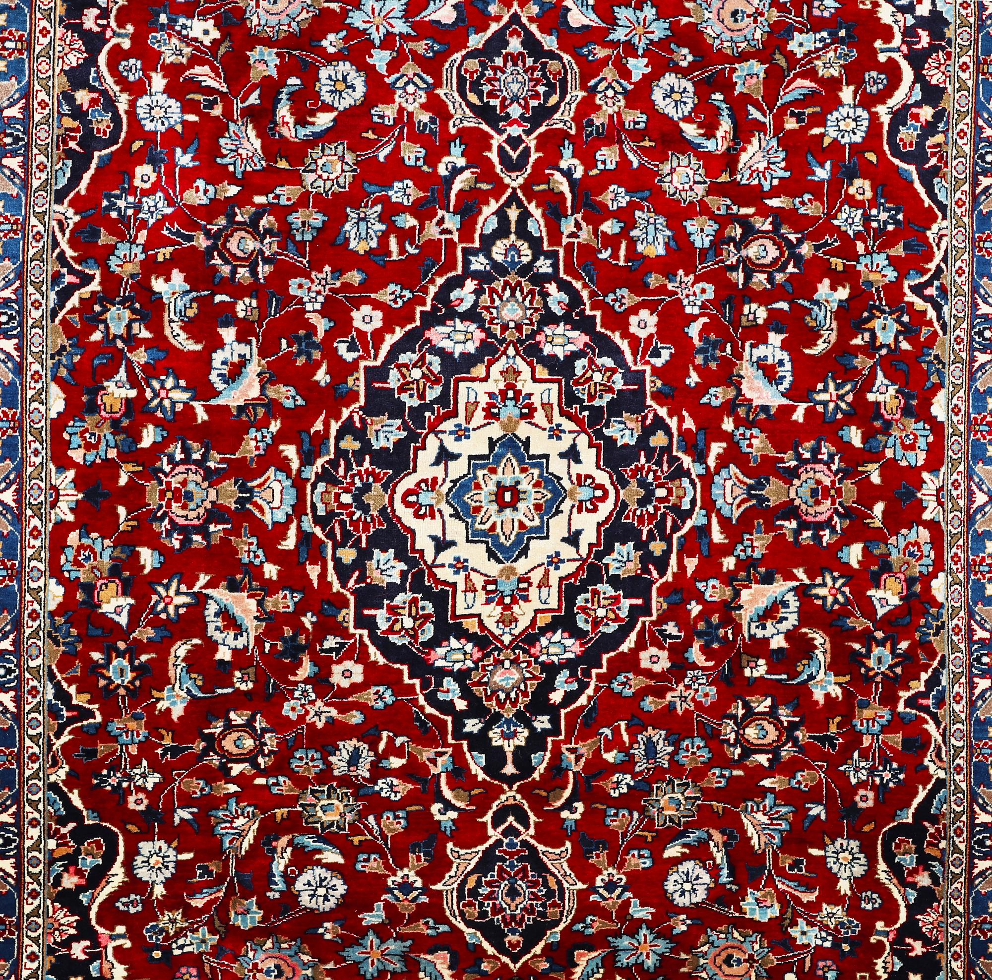 A carpet, Mashad, ca 346 x 248 cm.
