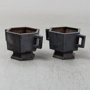 A pair of garden urns, cast iron.