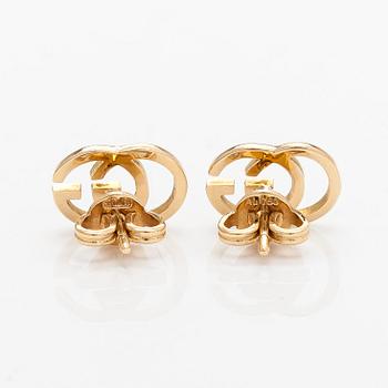Gucci, a pair of 18K gold "GG Running" earrings.