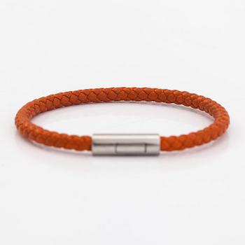 Hermès, A leather and metal bracelet. Marked Hermès Made in Italy.
