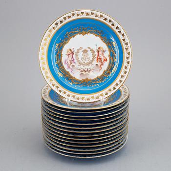 A set with two porcelain tazzas and 15 plates, France, "Sevrès", late 19th Century.