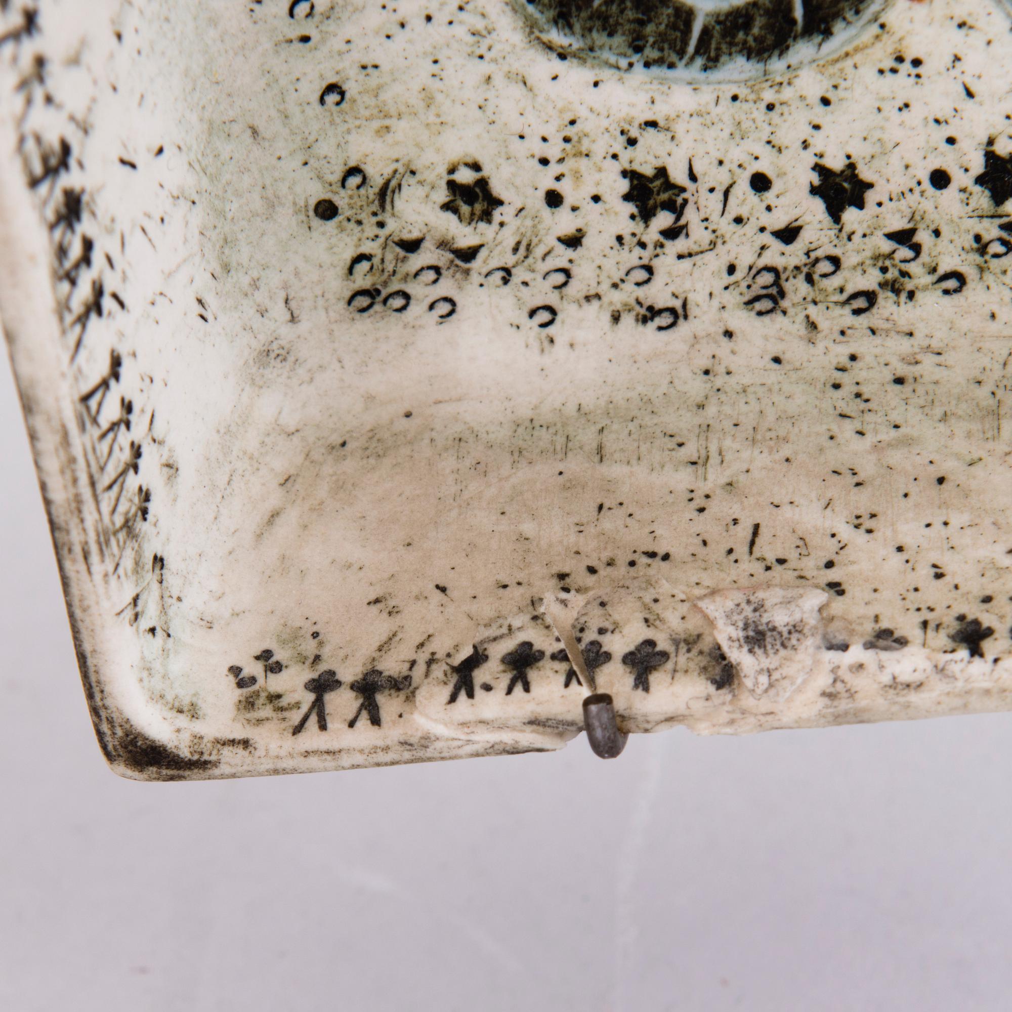 RUT BRYK, A stoneware relief signed a tergo Bryk.