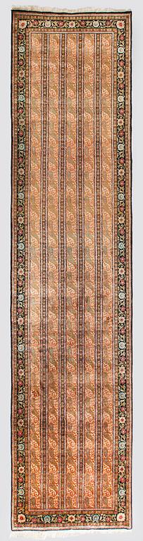 A runner, Ghom, silk. Approx. 100 x 425 cm.
