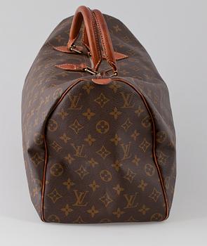 A Louis Vuitton bag, "Speedy".